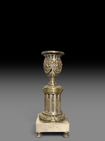 Pair of silver-plated bronze candlesticks...