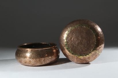 A pair of two circular copper-plated brass...