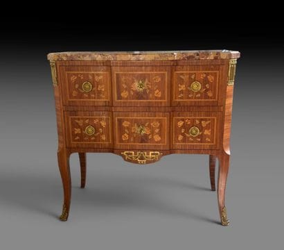 Chest of drawers with a central raised panel,...