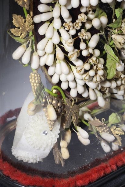 Bridal wreath under a glass dome. 

Height:...
