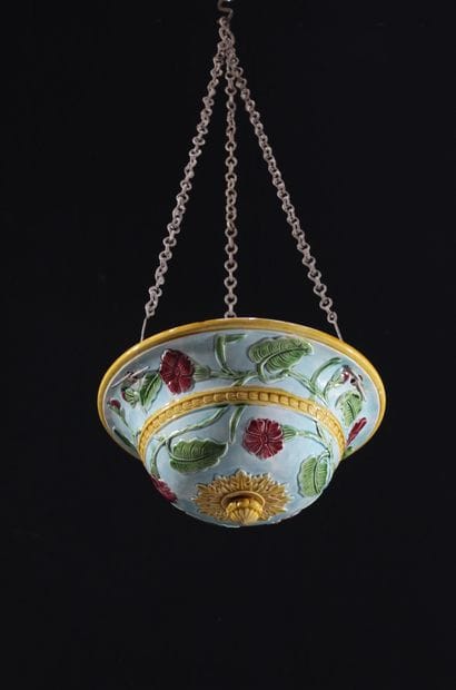 A fine earthenware hanging ornament decorated...