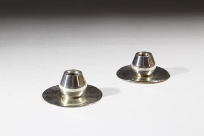 A pair of small modernist silver plated metal...