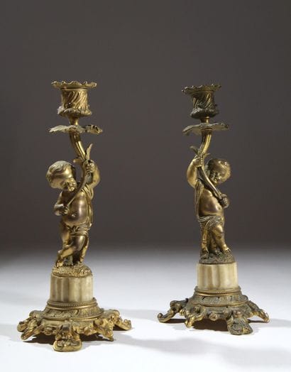 Pair of gilded bronze candlesticks, chiseled...