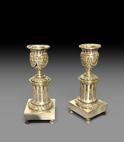 Pair of silver-plated bronze candlesticks...