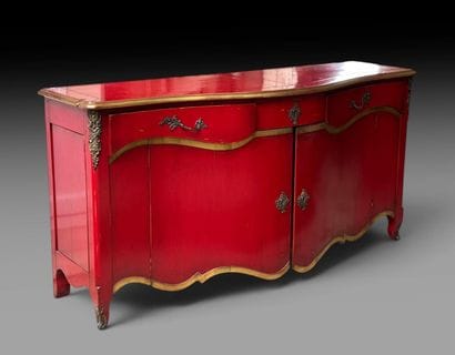 A red-lacquered wooden sideboard with gold...