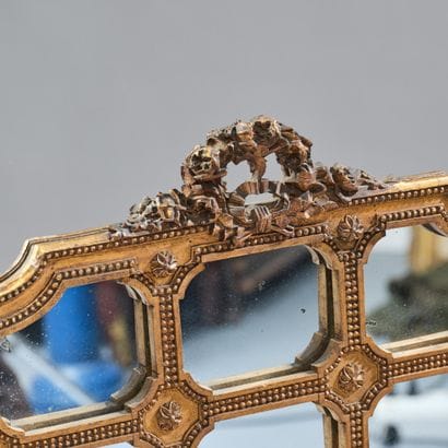 A three-panel folding screen made of stuccoed...