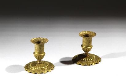 Pair of candlesticks made of repoussé-worked...