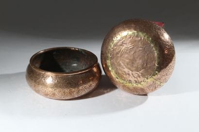 A pair of two circular copper-plated brass...