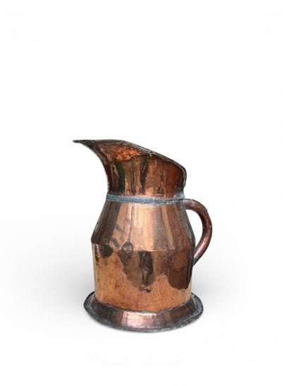 Large copper pitcher.
19th century