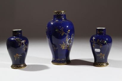 CARLTON WARE
A porcelain set with an enameled...
