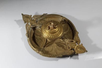 Bronze inkwell 
with rich decoration featuring...