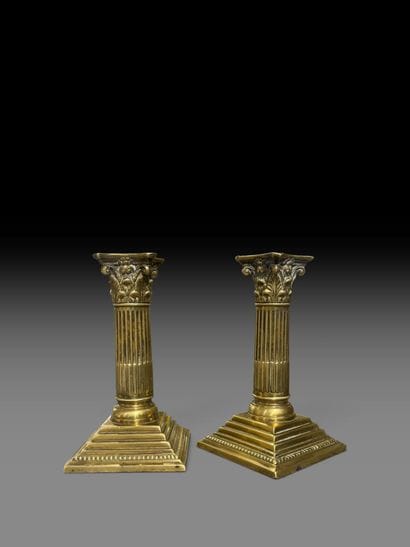 Pair of gilded, chiseled bronze candlesticks...