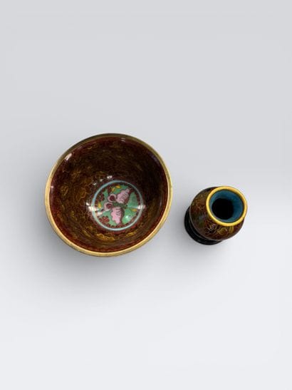 Reunion of a bowl and a small vase decorated...