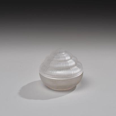 Reunion of four pressed glass poudriers including...