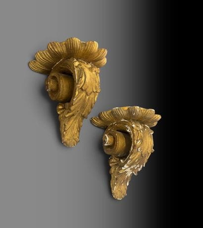 Pair of stuccoed and gilded wooden wall sconces...