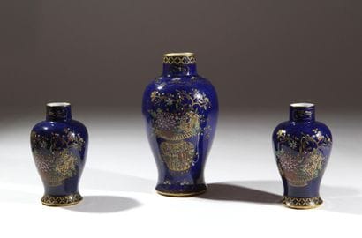 CARLTON WARE
A porcelain set with an enameled...