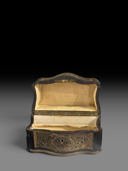 Small jewelry box in the shape of a miniature...