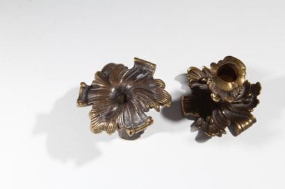 Pair of patinated bronze candlesticks with...