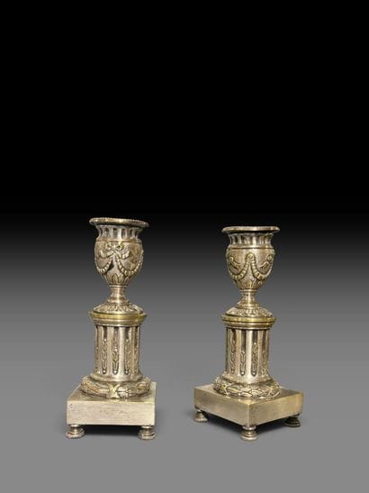 Pair of silver-plated bronze candlesticks...