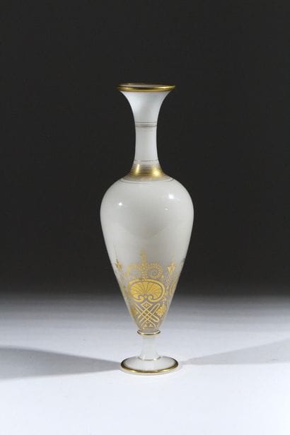 Opaline glass vase on a foot, with a baluster-shaped...