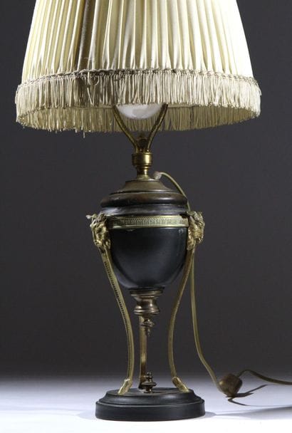 Metal lamp with a dark patina and gilded...