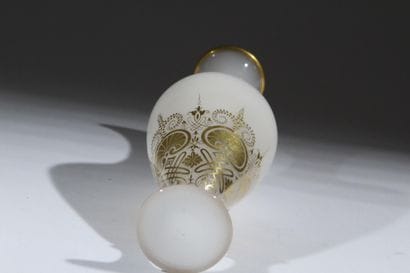 Opaline glass vase on a foot, with a baluster-shaped...