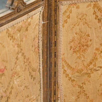 A three-panel folding screen made of stuccoed...