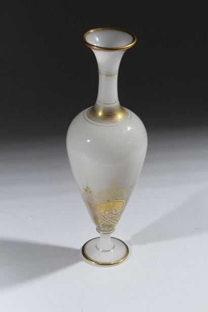Opaline glass vase on a foot, with a baluster-shaped...