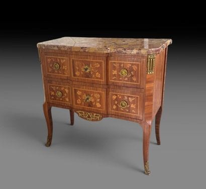 Chest of drawers with a central raised panel,...