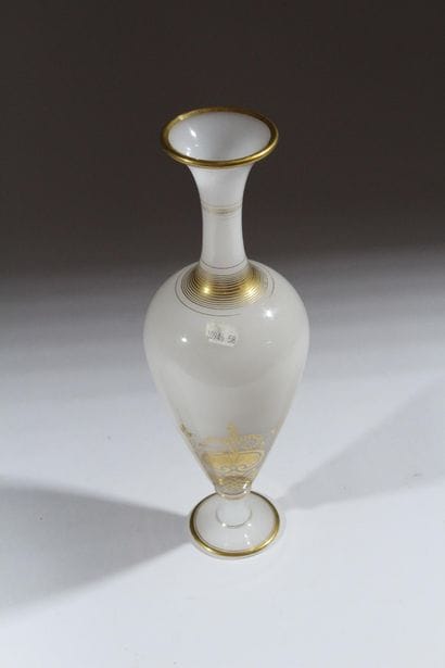 Opaline glass vase on a foot, with a baluster-shaped...