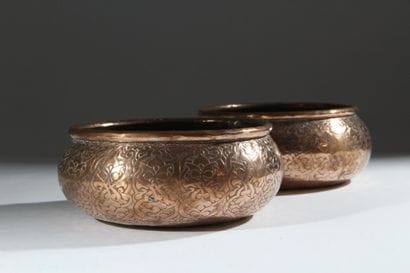 A pair of two circular copper-plated brass...