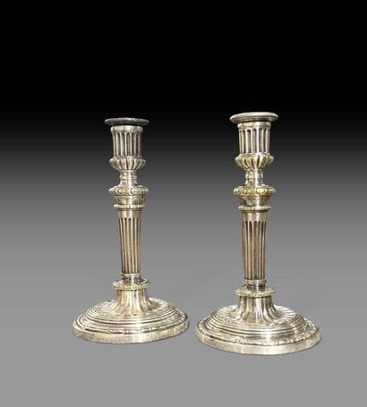 Pair of silver-plated bronze candlesticks...