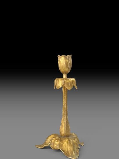 Gilded, chiseled bronze tripod torch with...