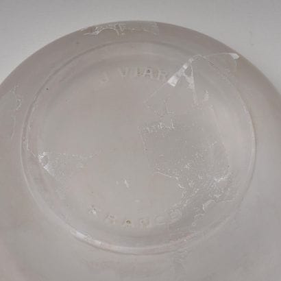 Reunion of four pressed glass poudriers including...
