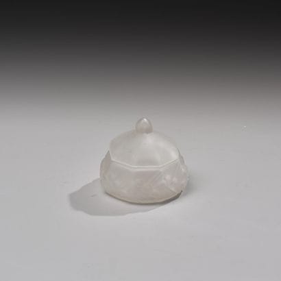 Reunion of four pressed glass poudriers including...