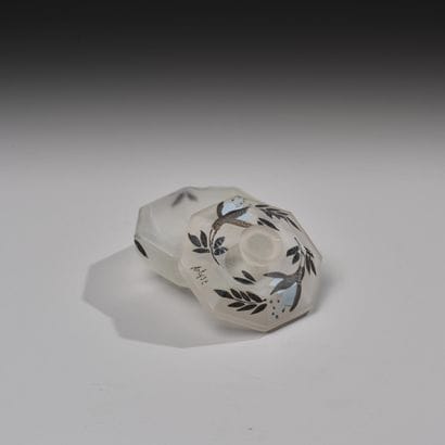 Reunion of four pressed glass poudriers including...
