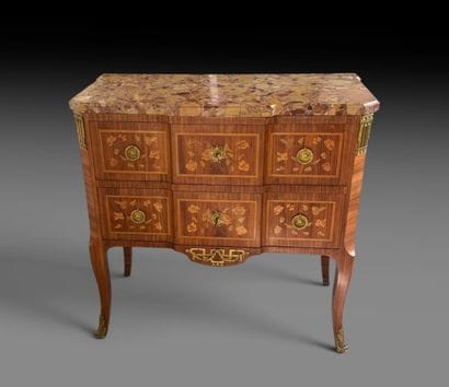Chest of drawers with a central raised panel,...