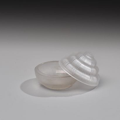Reunion of four pressed glass poudriers including...