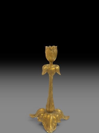 Gilded, chiseled bronze tripod torch with...