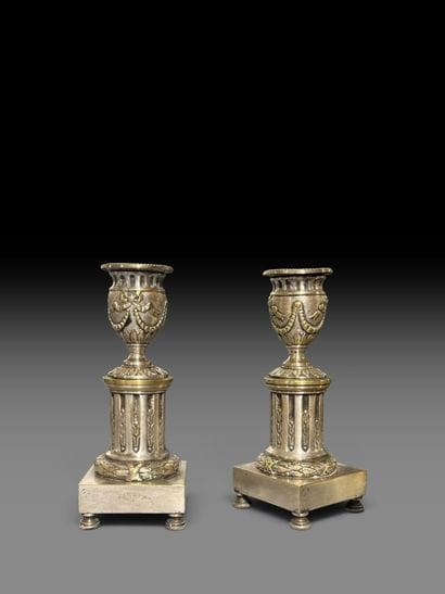 Pair of silver-plated bronze candlesticks...
