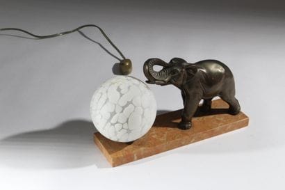 Desk lamp consisting of a painted glass globe...
