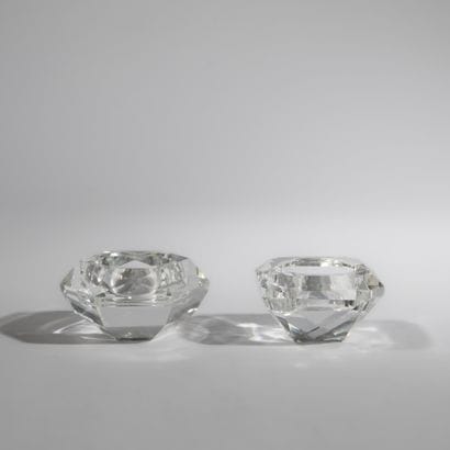 Pair of octagonal cut crystal faceted salerons.
Work...