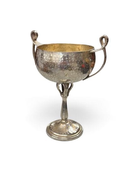 In the style of Jean DESPRES (1889–1980)
Hammered,...