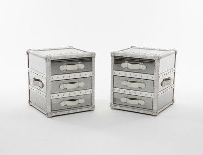 A pair of storage units, each with three...
