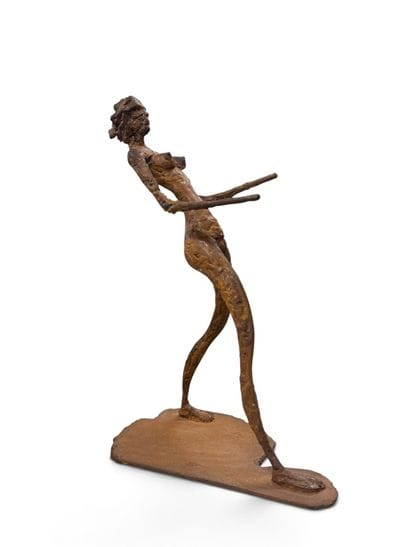 MODERN SCHOOL
Stylized Woman
Cast iron sculpture....