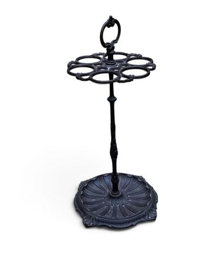 Black-lacquered cast-iron umbrella stand...