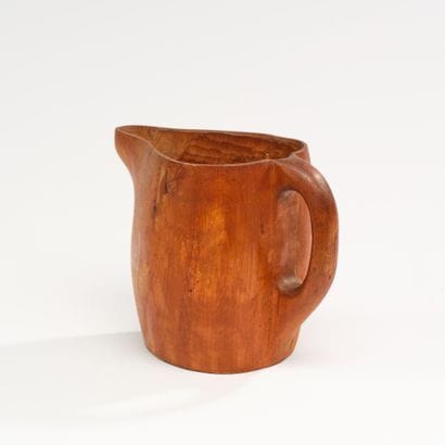 FRENCH CRAFTSMANSHIP
Carved wooden pitcher...