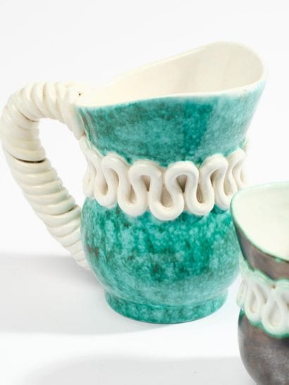 SAINTE-RADEGONDE 
A pair of turquoise-glazed...