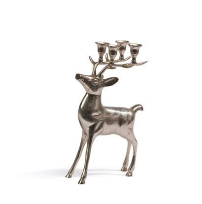 Candélabre zoomorphe à quatre lumières métal...