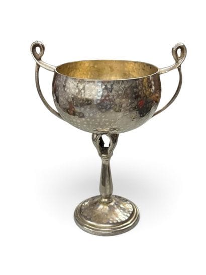 In the style of Jean DESPRES (1889–1980)
Hammered,...